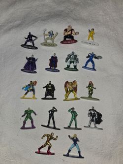 These appear to be Jada Toys Nano Metalfigs die-cast metal mini action figures DC & TNMT