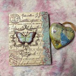 vintage-style decorative collectibles featuring butterflies, handwriting scripts, and a "faith" motif. 