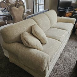 Cream Couch With A Pull-Out Bed