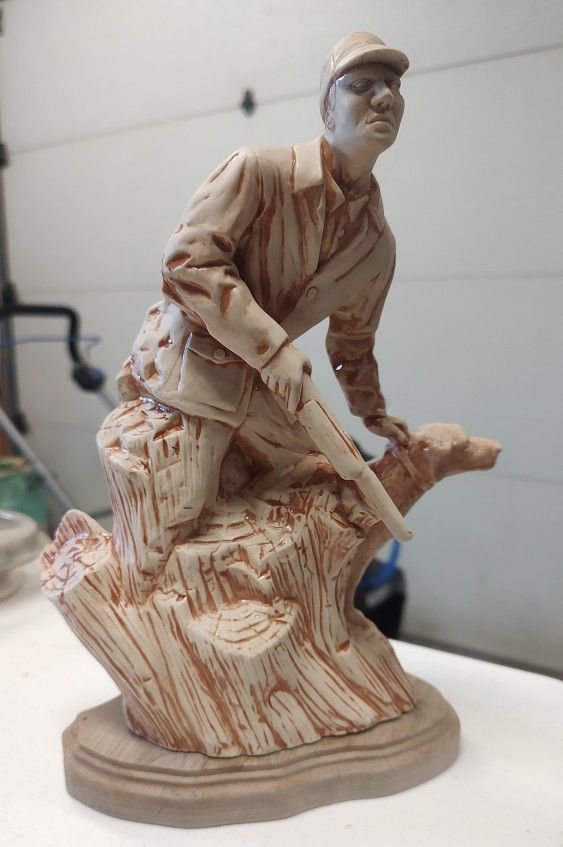 Porcelain Hunter Figurine 