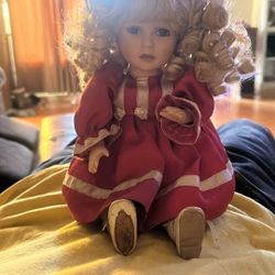 Musical porcelain doll