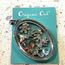 New Origami Owl Heirloom Silver Hinged Oval Living Locket  Mother’s Day Gift NIB Boy Girl  Only 1 available  11 floating charms.  Locket opens