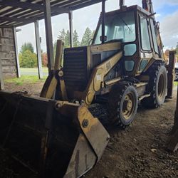 1990 Caterpillar 428 Loader Backhoe Series II