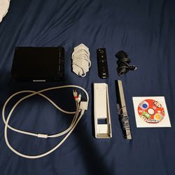 WII WITH GAME FOR 50 