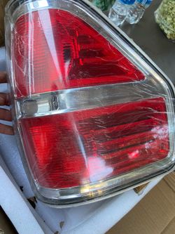 Ford f-150 09-14 left hand rear light