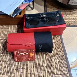 Cartier sunglasses includes case and box