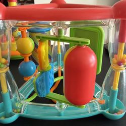 This is an activity triangle, a developmental toy designed for babies and toddlers