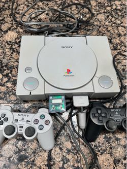 Play station 1 with two controllers and grand turismo 1