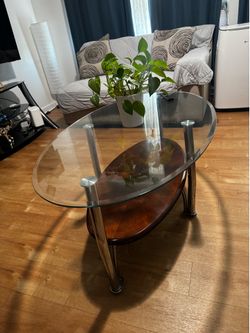 Glass table with wood shelf