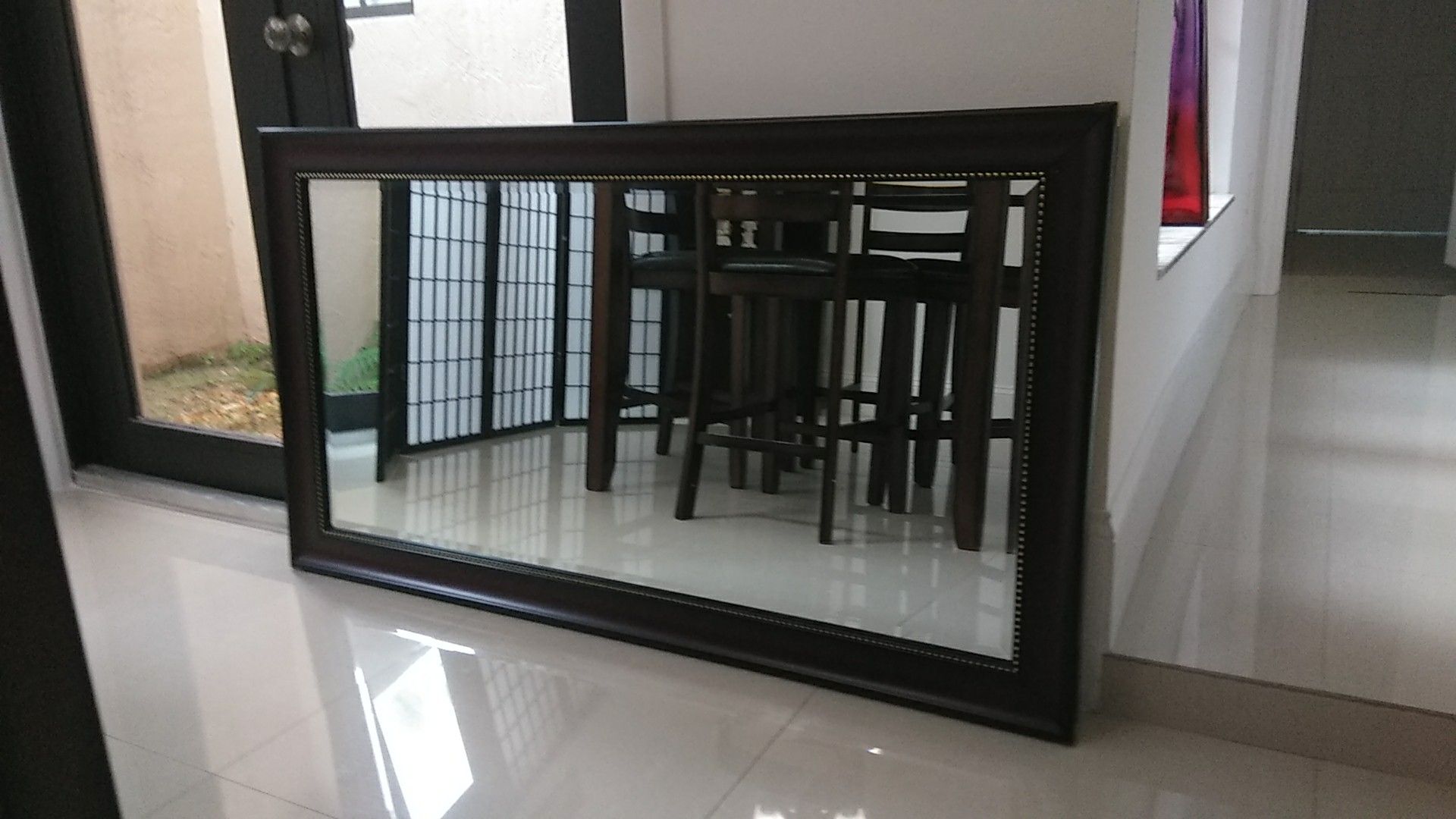 Excellent wall mirror. 55" x 30" excellent condition