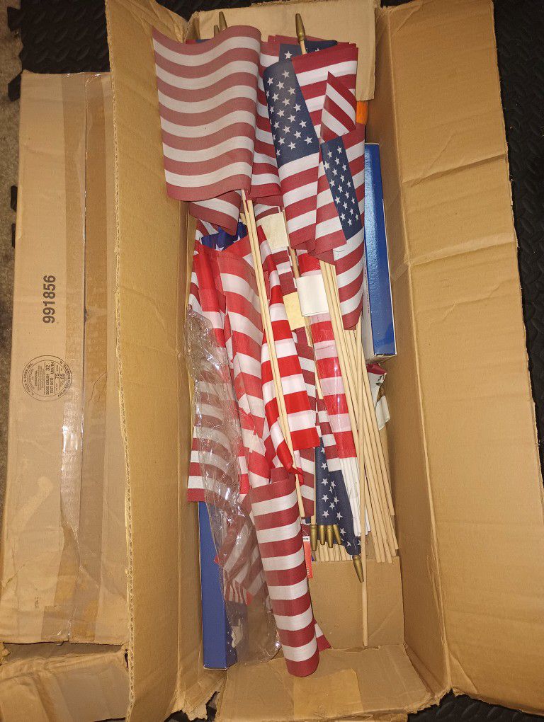 Box Filled With American Flags 