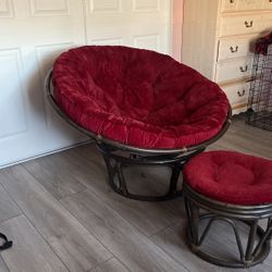 Red Chair With Stool Made Out Of Bamboo