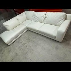Italian Leather Sectional Almost New Condition .. No Fade , No Rips … We Deliver