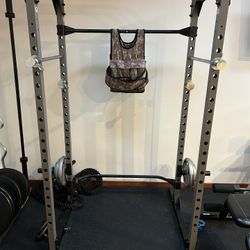 Fitness Reality Power Rack + Dip Bars + Weight Plates (25/10/5) + Barbell(s) — $350