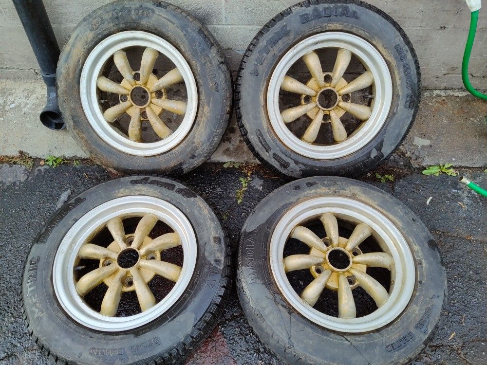 4 lug VW bug or beetle 15 inch Empi 8 spoke rims