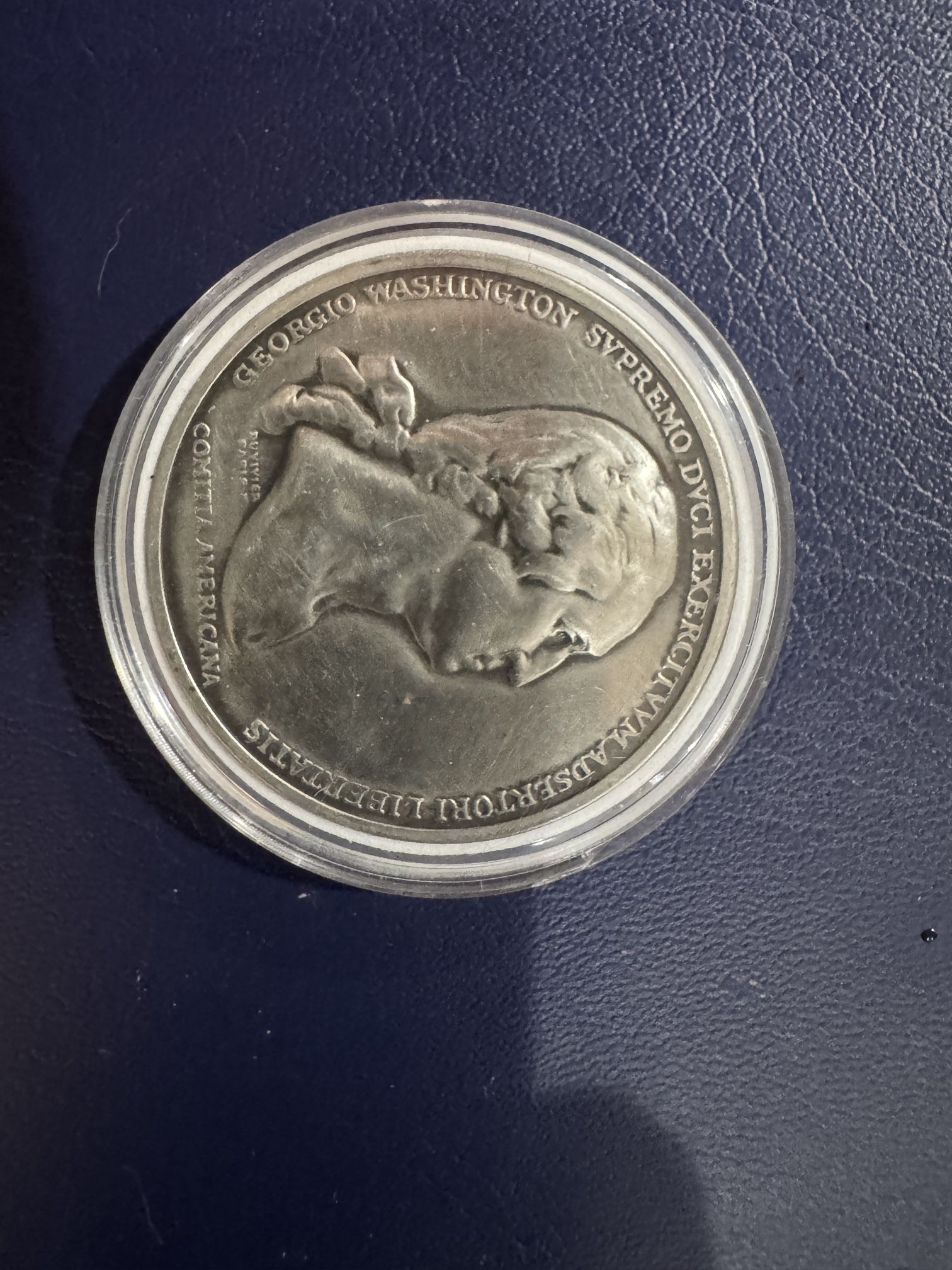 This is a George Washington pewter medal.