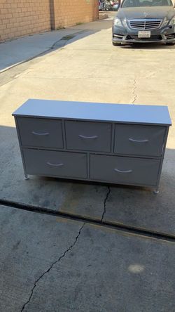 Small white storage for shoes socks etc.