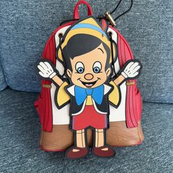 Loungefly $30 Pinnochio Articulating backpack **