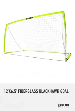 The soccer goal is a 12' x 6.5' fiberglass frame with a neon yellow border and black netting