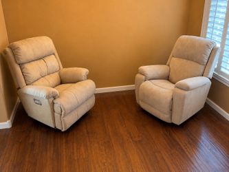 Cream upholdered La-Z-Boy power reclining chairs