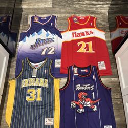Throwback NBA Jerseys (sizes Below) Indiana Pacers, Toronto Raptors, Utah Jazz, and Atlanta Hawks