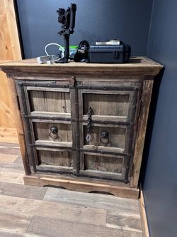 Rustic Wood Cabinet with Iron Hardware