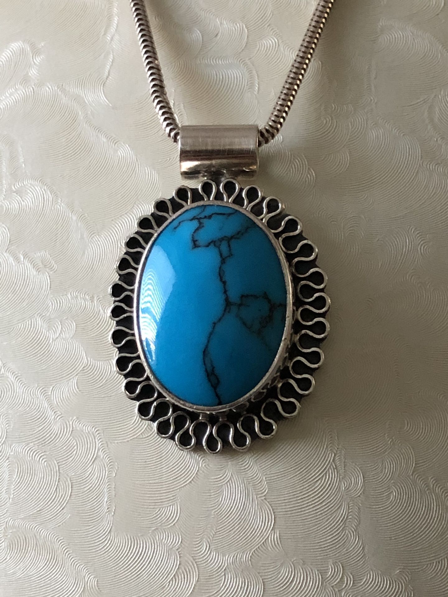 Jewelry, pendant necklace engraved Mexico sterling silver, 1.5”oval Turquoise,19” chain