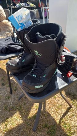 Thirty two snow boarding boots