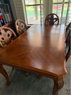 Hand made dining table and 8 chairs