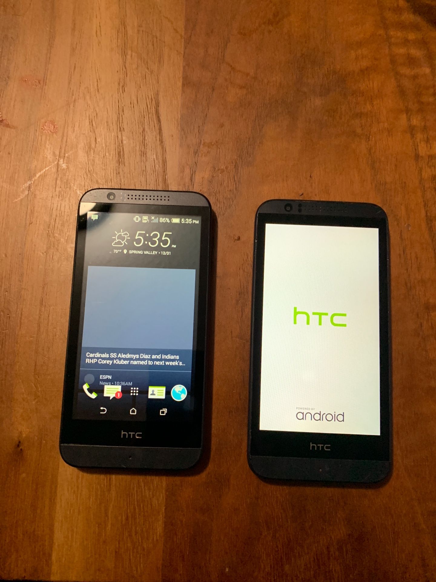 Two cricket HTC Android phones