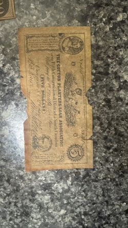 five-dollar Confederate banknote issued by The Cotton Planters Loan Association of the Fifth Congressional District of South Carolina & Part Of 100 . 