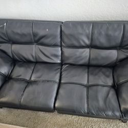 Faux Leather Couch - Can fold out into twin bed
