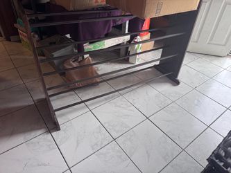 $15 OBO Shoe rack in good condition pick up only