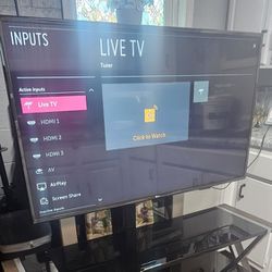 LG Smart TV  With Stand Smoke Free Like New