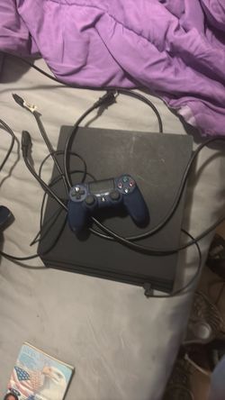 Sony PlayStation 4 Slim Console with Controller