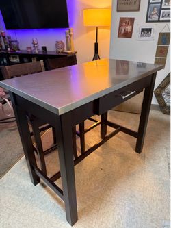 Table with stainless steal top