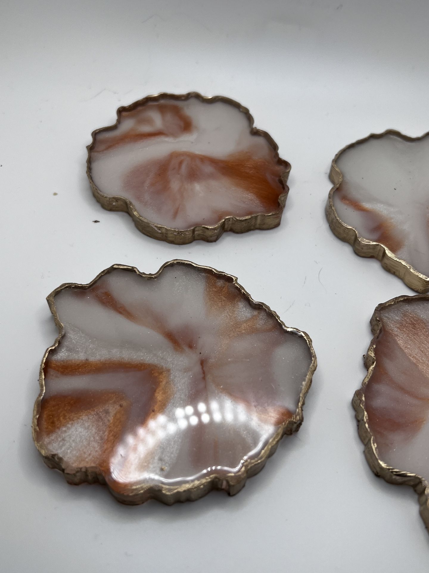 Set Of Four Copper And White Handmade Resin Coasters