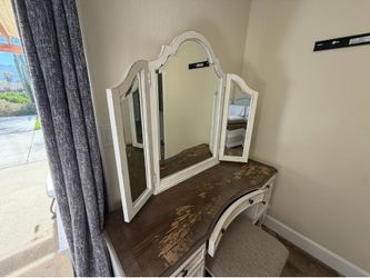 Vanity desk with mirrors and stool