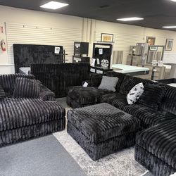 New Midnight Madness Sectional $1599, Ottoman $349. Oversize Chaise $999. Delivery Available
