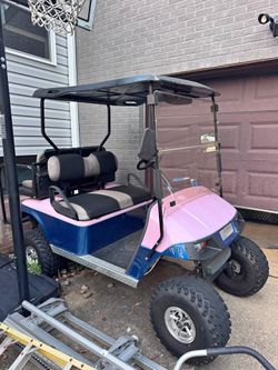 2021 EZGO Lifted Golf Cart with Sound System