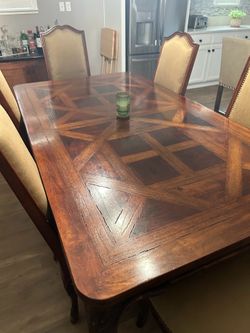 Dining room table and chairs with leafs