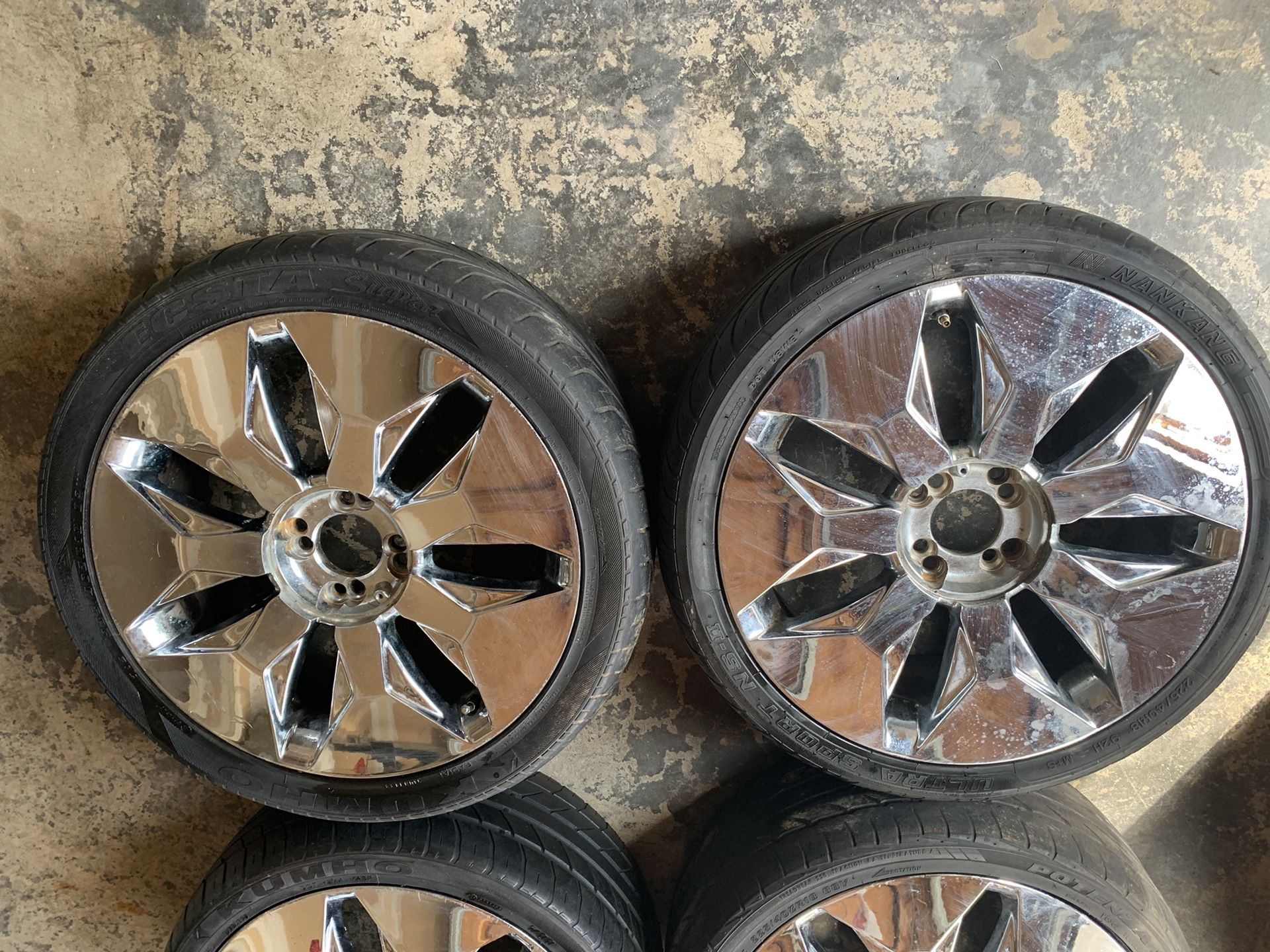 Four 4 lug universal 18 inch chrome mirror rims with 225/40zr18 inch tires on all four rims