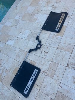 Rock Tamers adjustable hitch-mounted mud flaps