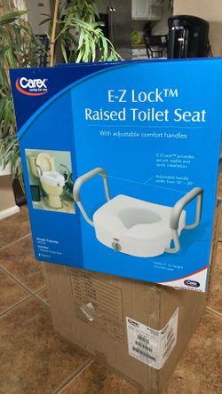 New In Unopened Box E-Z Lock Raised Toilet Seat With Adjustable Comfort Handles