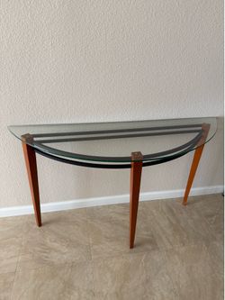 Half-moon glass top console table