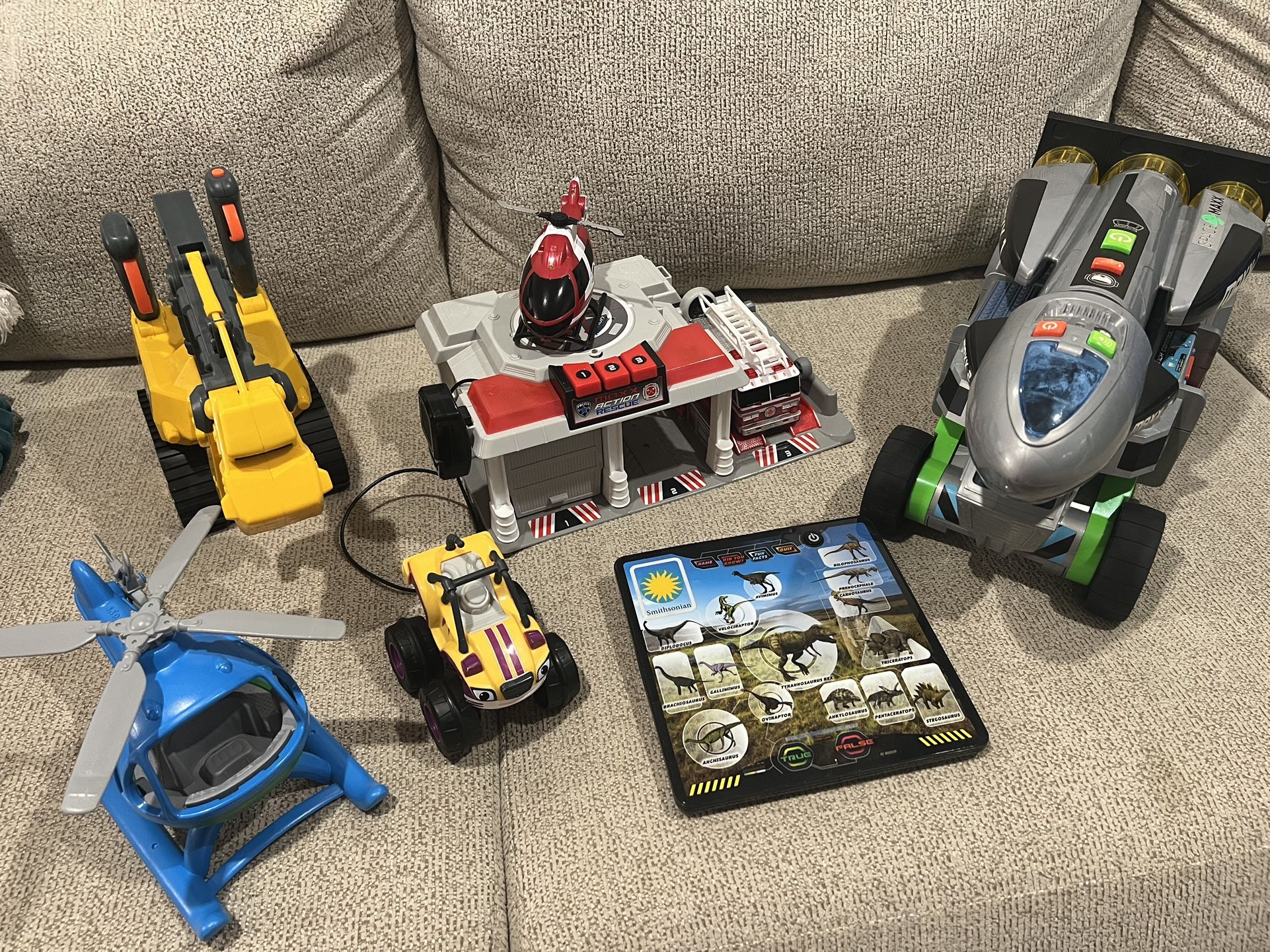 Lot Of Vehicle And Dinosaur Toys.