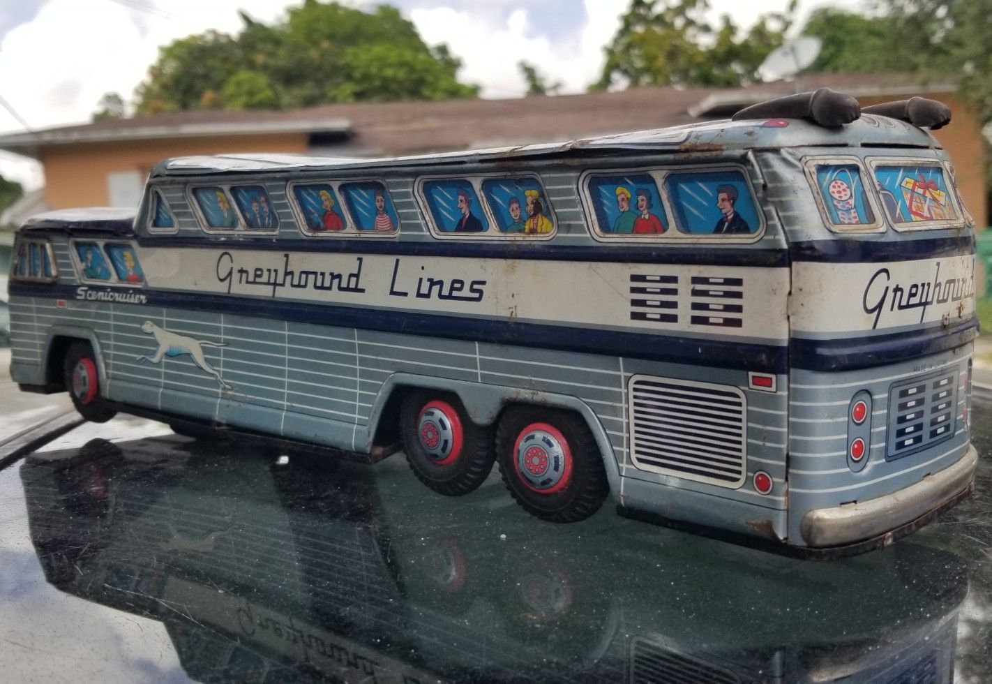 Tin toy top greyhound bus