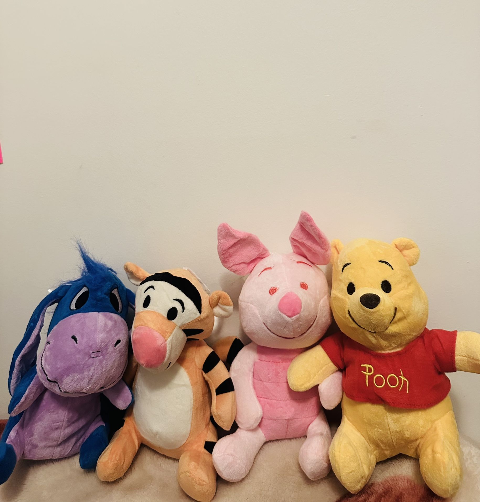 Winnie The Pooh, Tigger, Piglet, Eeyore stuffed animals