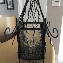 Hanging black metal and glass candle holder 10.5" tall 7" wide Paid $25, selling for $10