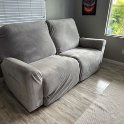 LIKE NEW!!  Dual Power Reclining Sofa (Negotiable)